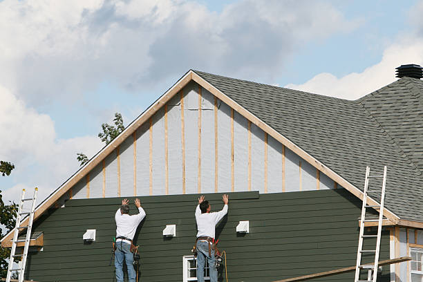 Professional Siding technician working in Raymond, OH